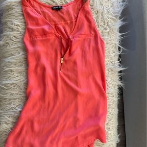 Coral colored express tank with gold accents